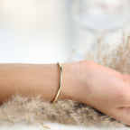 Unique agate slice cuff bracelet with double stones and gold-edged finish on brass