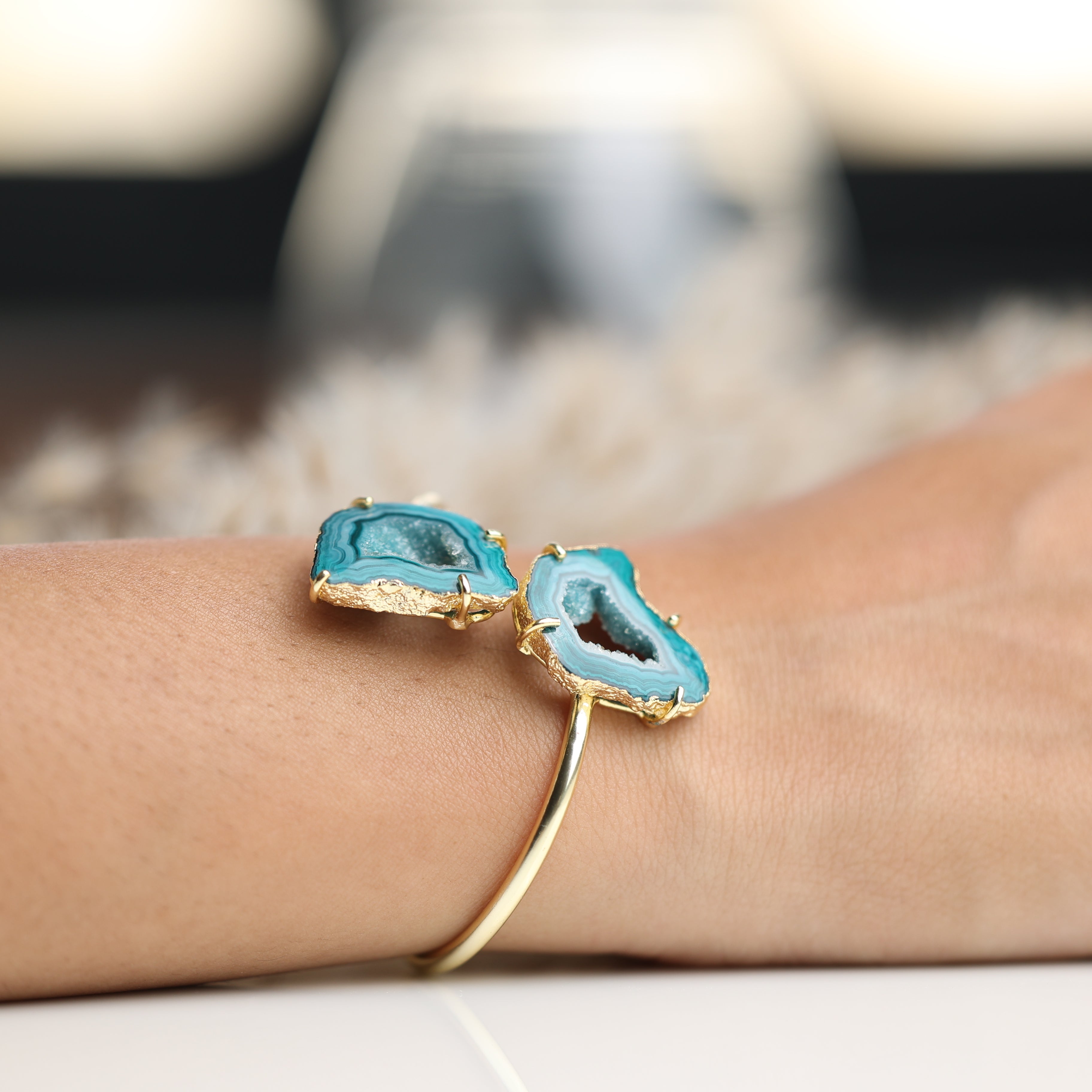 Gold-edged agate slice bracelet with two natural stones on adjustable brass cuff